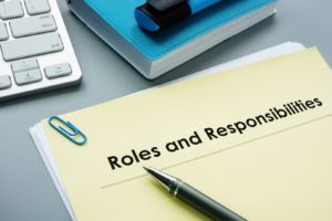 Roles and Responsibilities written on a notepad