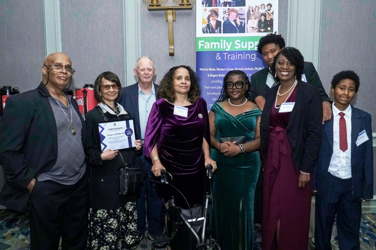 Rogera Robinson's family hold her certiricate