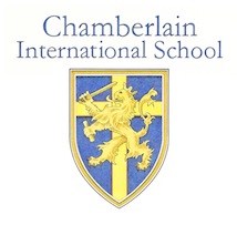 Chamberlain International School Logo. A blue and yellow shield featuring a stylized image of a dragon-like creature